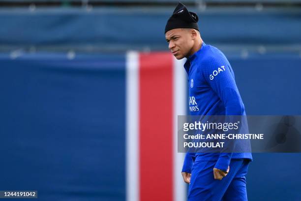 Paris Saint-Germain's French forward Kylian Mbappe attends a training session at the club's Camp des Loges training ground in Saint-Germain-en-Laye,...