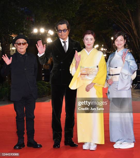 Actresses Ryoko Hirosue, Shinobu Terajima, actor Etsushi Toyokwa and director Ryuichi Hiroki arrive at the 2022 Tokyo International Film Festival at...