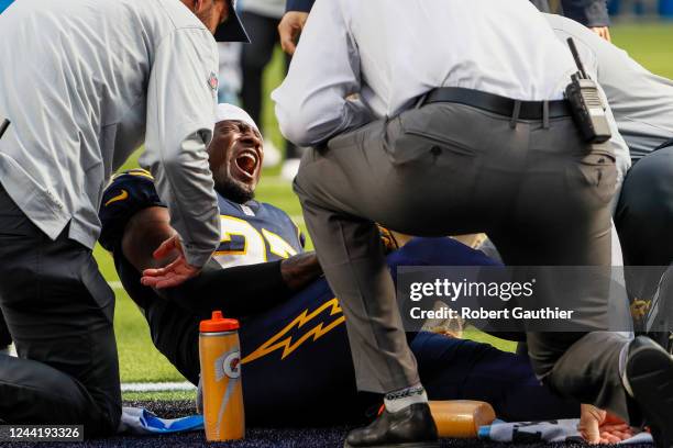 Inglewood, CA, Sunday, October 23, 2022 - Los Angeles Chargers cornerback J.C. Jackson screams out in pain after injuring himself on a play late in...