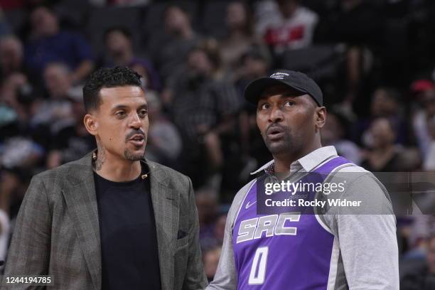 Former NBA players Matt Barnes and Metta Sandiford-Artest talk prior to the game between the Portland Trail Blazers and Sacramento Kings on October...