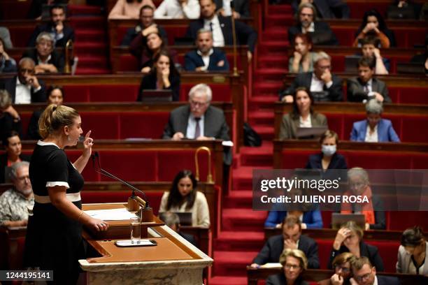 The president of the leftist party LFI parliamentary group at the National Assembly Mathilde Panot addresses deputies during a debate prior to two...