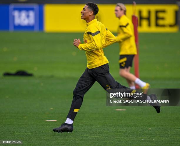 Dortmund's English midfielder Jude Bellingham takes part in a training session on the eve of the UEFA Champions League group G football match BVB...