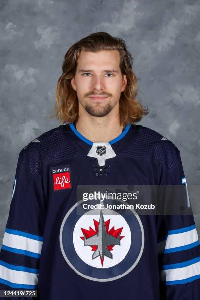 Axel Jonsson-Fjallby of the Winnipeg Jets poses for his official headshot for the 2022-2023 season on October 24, 2022 at Canada Life Centre in...