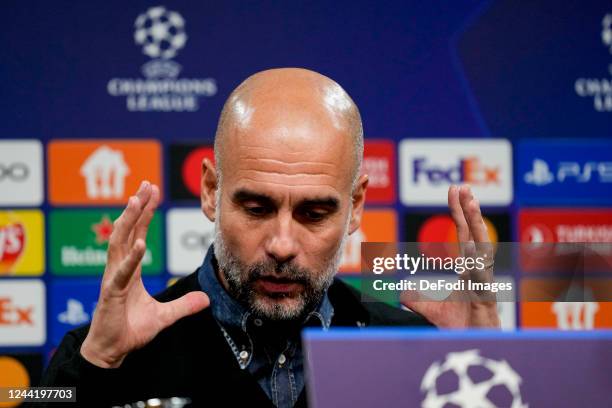 Head coach Pep Guardiola of Manchester City looks on during the Press Conference ahead of their UEFA Champions League group G match against Borussia...