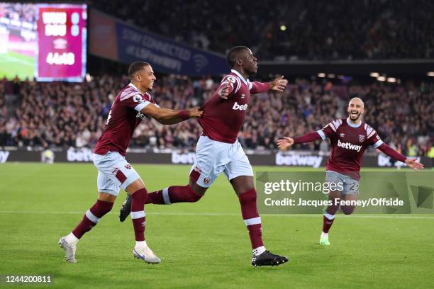 Kurt Zouma of West Ham celebrates scoring the opening goal with Thilo Kehrer during the Premier League match between West Ham United and AFC...