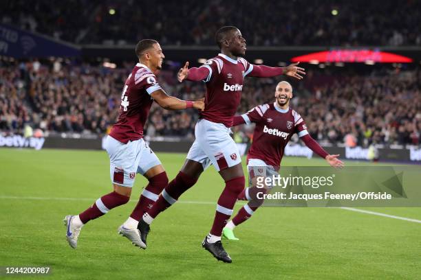 Kurt Zouma of West Ham celebrates scoring the opening goal with Thilo Kehrer during the Premier League match between West Ham United and AFC...