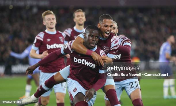 West Ham United's Kurt Zouma celebrates scoring his side's first goal with Thilo Kehrer during the Premier League match between West Ham United and...