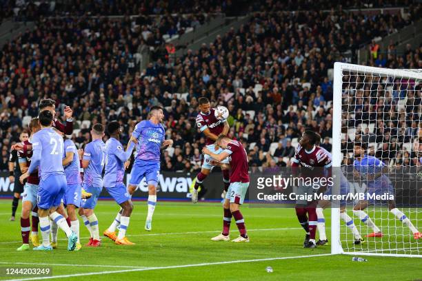 Checks if Thilo Kehrer of West Ham United has handled the ball in the build up to the opening goal during the Premier League match between West Ham...