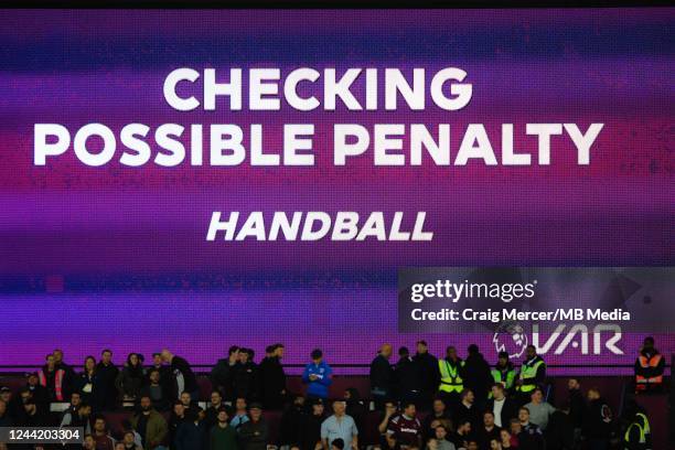 Checking possible penalty to West Ham United for handball during the Premier League match between West Ham United and AFC Bournemouth at London...