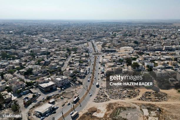 An aerial view shows the Arab-Israeli town of Rahat in the southern Negev desert on October 7, 2022. - While the campaign ahead of Israel's fifth...