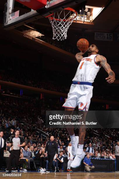 Obi Toppin of the New York Knicks dunks the ball during the game against the Orlando Magic on October 24, 2022 at Madison Square Garden in New York...