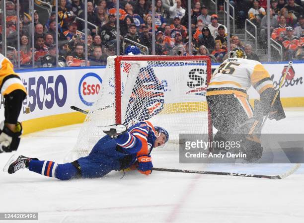 Connor McDavid of the Edmonton Oilers crashes into the net during the game against the Pittsburgh Penguins on October 24, 2022 at Rogers Place in...