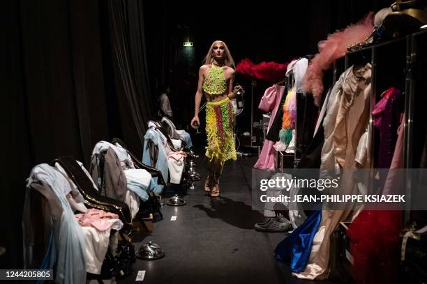 In this photograph taken on October 21, 2022 a drag queen from the first season of the "Drag Race France" TV show, prepares at the backstage of an...