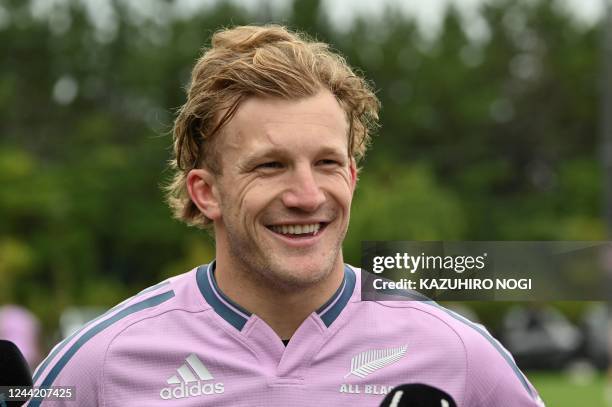 New Zealand's Damian McKenzie speaks to the media during a training session in Urayasu, Chiba prefecture on October 25 ahead of the rugby Test match...