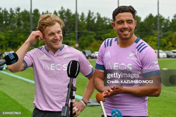 New Zealand's Anton Lienert-Brown and Damian McKenzie speak to the media during a training session in Urayasu, Chiba prefecture on October 25 ahead...