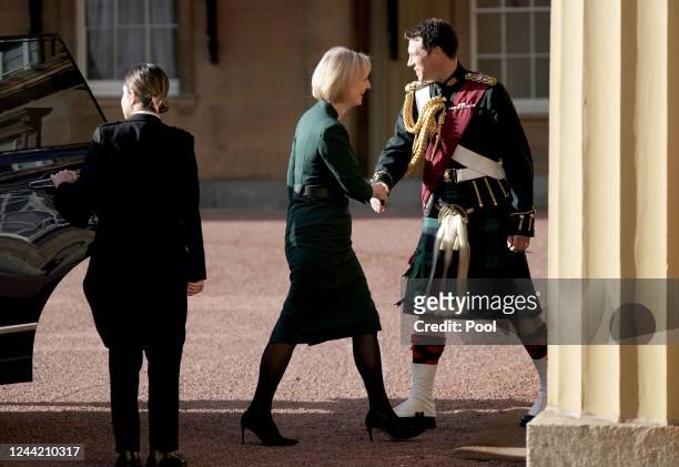 Outgoing Prime Minister Liz Truss arrives at Buckingham Palace for an audience with King Charles III to formally resign as PM on October 25, 2022 in...