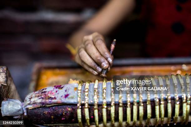 Bangle Making Bangle Maker Photos and Premium High Res Pictures - Getty Images