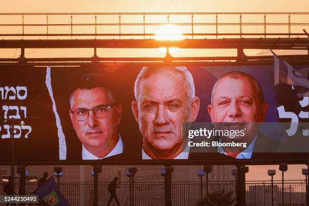 An election billboard for the Hamachane Hamamlachti party, featuring Benny Gantz, Israel's defense minister, center, Gideon Sa'ar, Israel's justice...