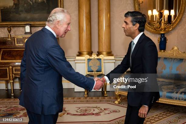 King Charles III welcomes Rishi Sunak during an audience at Buckingham Palace, where he invited the newly elected leader of the Conservative Party to...