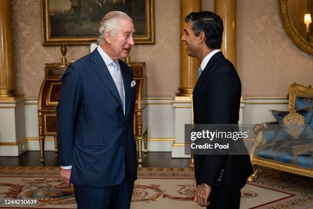 King Charles III welcomes Rishi Sunak during an audience at Buckingham Palace, where he invited the newly elected leader of the Conservative Party to...