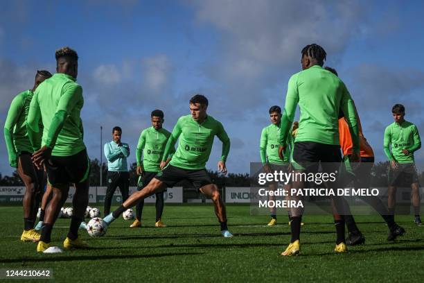 Sporting Lisbon's Uruguayan midfielder Manuel Ugarte and teammates take part in a training session at the Cristiano Ronaldo academy training ground...