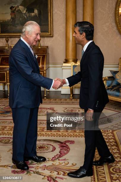 King Charles III welcomes Rishi Sunak during an audience at Buckingham Palace, where he invited the newly elected leader of the Conservative Party to...