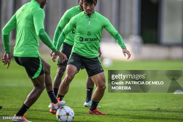 Sporting Lisbon's Japanese midfielder Hidemasa Morita controls the ball during a training session at the Cristiano Ronaldo academy training ground in...