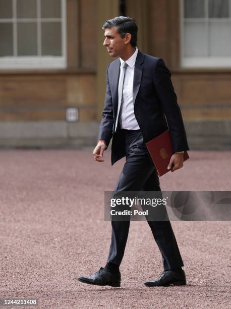 Newly elected leader of the Conservative Party Rishi Sunak arrives at Buckingham Palace for an audience with King Charles III where he will be...