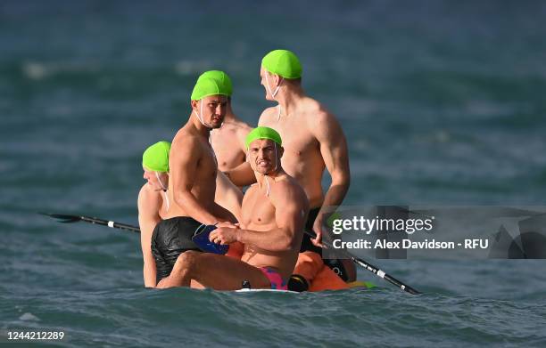 Marcus Smith and Henry Slade of England take part in a England Training session on St Brelade's Bay Beach on October 25, 2022 in Saint Peter, Jersey .