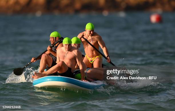 Mako Vunipola, Cadan Murley and Jack Singleton of England take part in a England Training session on St Brelade's Bay Beach on October 25, 2022 in...