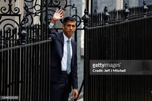 British Prime Minister Rishi Sunak poses after taking office outside Number 10 in Downing Street on October 25, 2022 in London, England. Rishi Sunak...