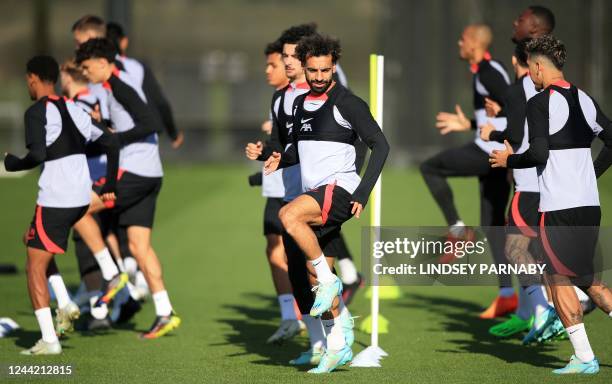 Liverpool's Egyptian striker Mohamed Salah attends a team training session at the AXA Training Centre in Liverpool, north-west England on October 25...