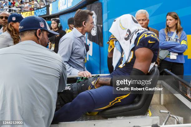 Inglewood, CA, Sunday, October 23, 2022 - Los Angeles Chargers cornerback J.C. Jackson is carted off the field after injuring his knee against the...