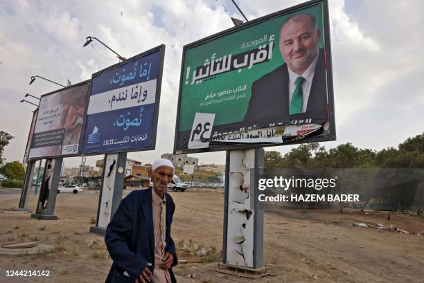 Electoral banners of Arab Israeli parties stand in the Bedouin city of Rahat near the southern Israeli city of Beersheva, on October 25, 2022 ahead...