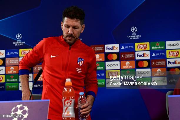 Atletico Madrid's Argentinian coach Diego Simeone arrives for a press conference at the club's training ground in Majadahonda near Madrid on October...