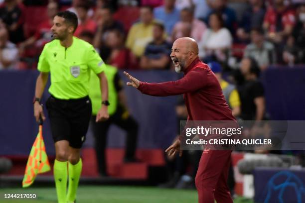 Sevilla's Argentinian coach Jorge Sampaoli shouts instructions to his players from the touchline during the UEFA Champions League 1st round day 5,...