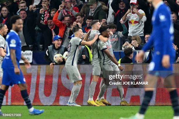 Salzburg's Austrian forward Chikwubuike Adamu celebrates after scoring a goal with team mates during the UEFA Champions League Group E football match...