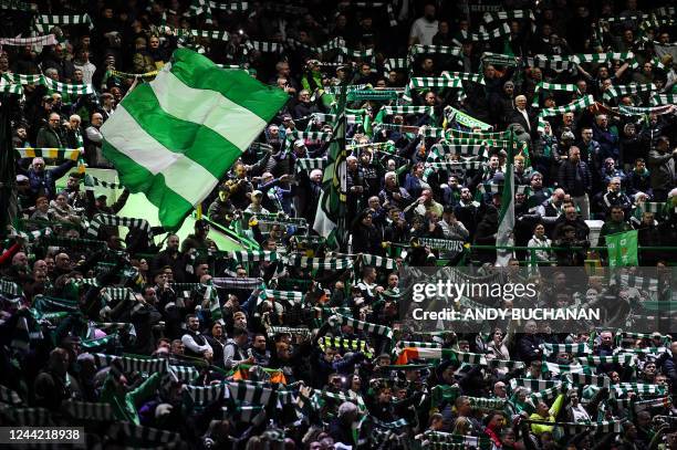 Celtic's supporters cheer during the UEFA Champions League Group F football match between Celtic FC and Shakhtar Donetsk, at the Celtic Park stadium...