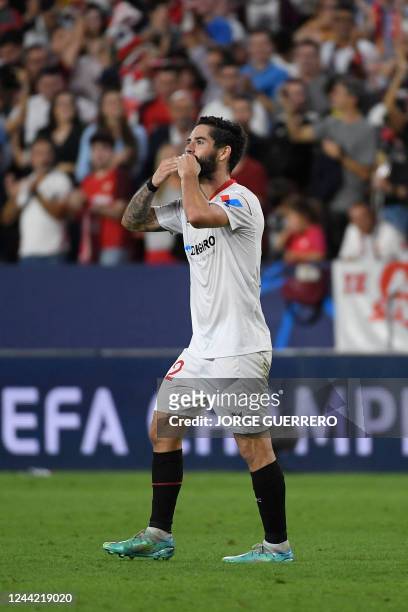 Sevilla's Spanish midfielder Isco celebrates scoring his team's second goal during the UEFA Champions League 1st round day 5, Group G football match...