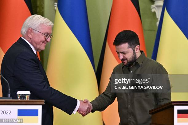 Ukraine's President Volodymyr Zelensky shakes hands with Germany's President Frank-Walter Steinmeier at the end of their joint press conference in...