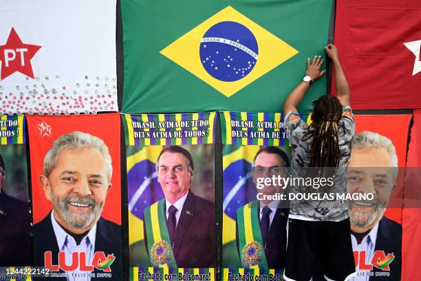 Towels with the images of Brazilian president and re-election candidate Jair Bolsonaro and former President and presidential cadidate Luiz Inacio...