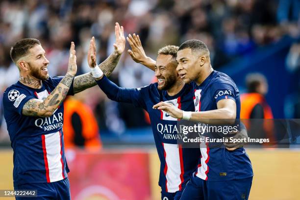 Kylian Mbappe celebrating his goal with his teammates Neymar Junior and Sergio Ramos of Paris Saint Germain during the UEFA Champions League group H...