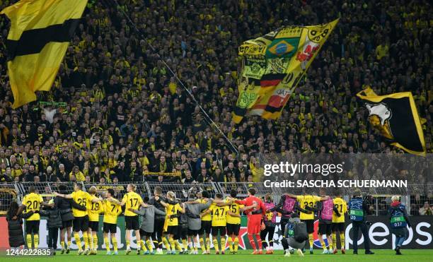 Dortmund's players celebrate with fans after the UEFA Champions League Group G football match between Borussia Dortmund and Manchester City in...