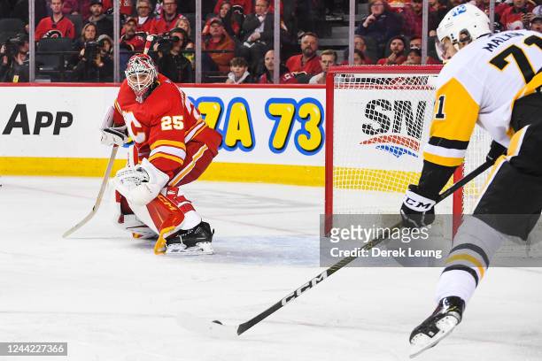 Evgeni Malkin of the Pittsburgh Penguins shoots and scores on Jacob Markstrom of the Calgary Flames during the second period at Scotiabank Saddledome...