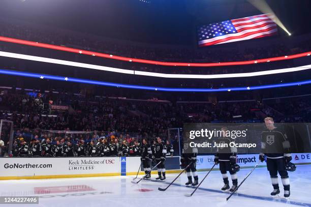Los Angeles Kings look on during the National Anthem prior to the game against the Tampa Bay Lightning at Crypto.com Arena on October 25, 2022 in Los...
