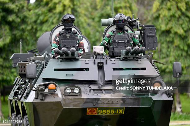 Indonesian soldiers takes part in a security drill in preparation for the G20 Summit, in Denpasar on Indonesia's resort island of Bali on October 26,...