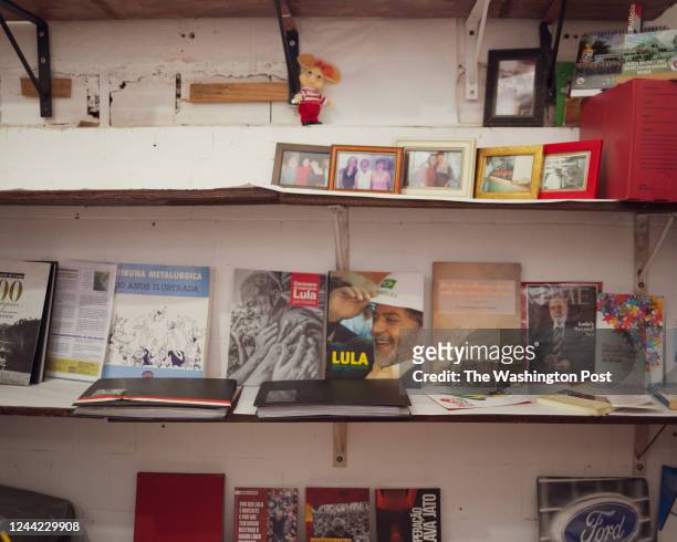Books and files about the struggle of metal workers and former Brazilian president, Lula, collected by Juno Oliveira da Silva, better known as Gijo....