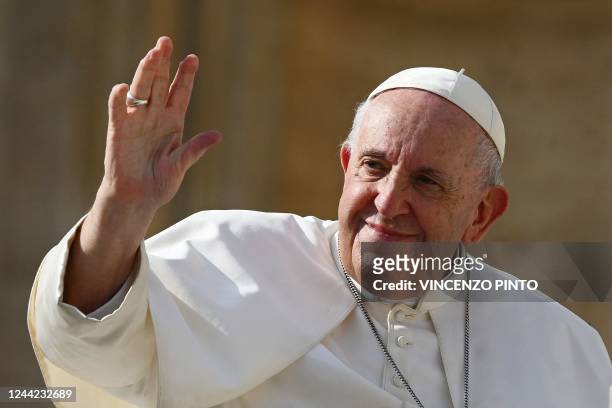 Pope Francis waves at the end of his weekly general audience at Saint Peter's Square in the Vatican on October 26, 2022.