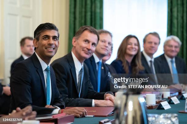 Britain's Prime Minister Rishi Sunak, Britain's Chancellor of the Exchequer Jeremy Hunt, Britain's Secretary of State for Business, Energy and...