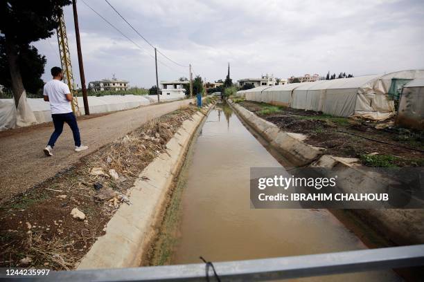 This picture taken on October 26, 2022 shows a view of a canal whose waters are contaminated with Cholera in Lebanon's northern Akkar district.